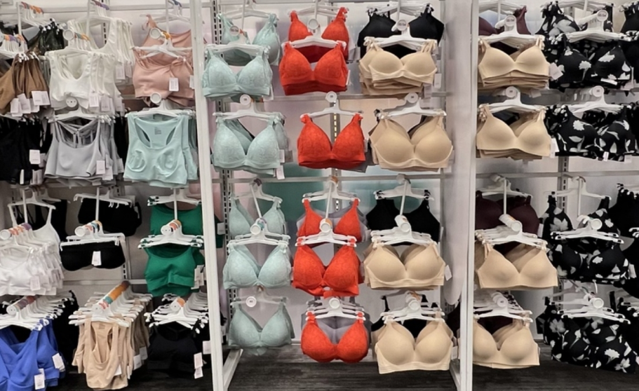 Save $10 When You Spend $30 on Target Bras & Bralettes a display wall of bras in a target store
