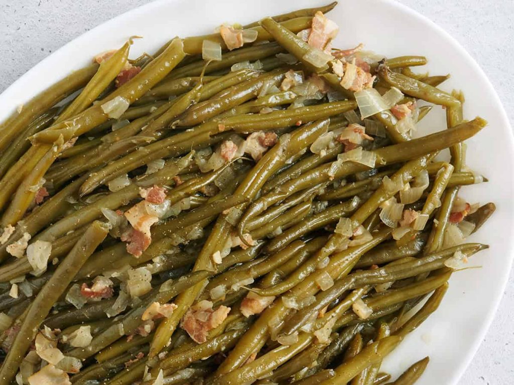 Slow cooker green beans on a platter.