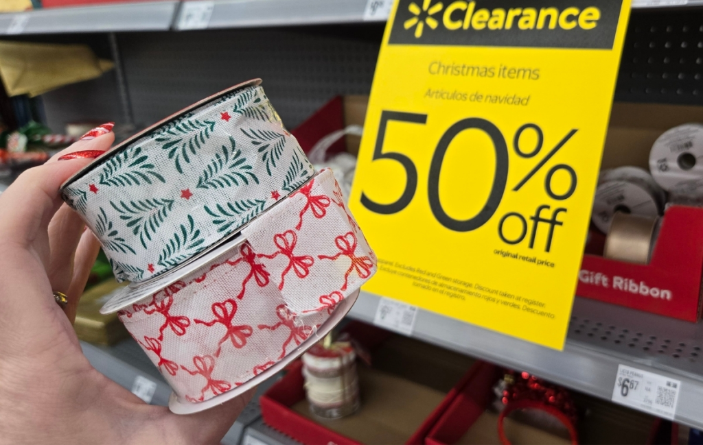 We Spotted 50% Off Walmart Christmas Clearance In-Store AND Online gift wrap ribbon on clearance aisle