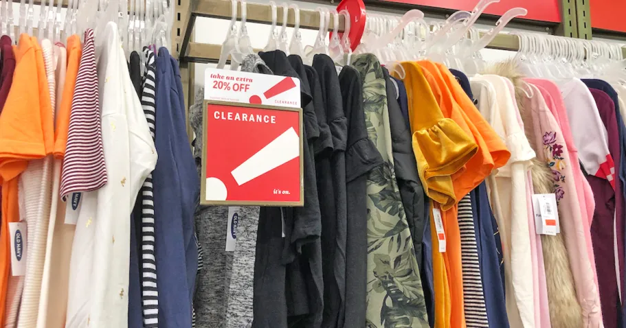 Up to 90% Off Old Navy Clearance (Styles from $1) rack of tops on hangers with clearance sign