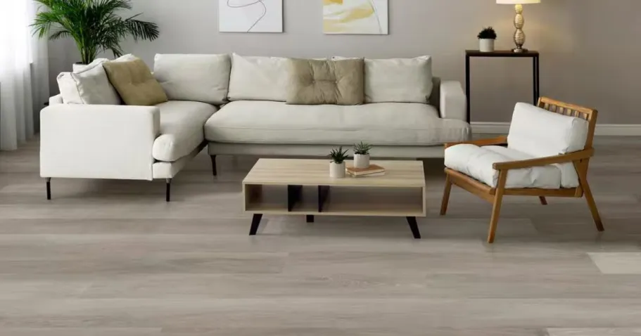 Click Lock Waterproof Vinyl Flooring from $1.99/Sq. Ft. on HomeDepot.com & Free Delivery A living room with waterproof flooring from Home Depot