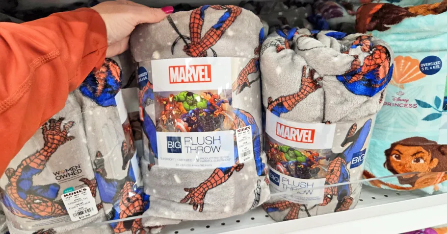 *HOT* Kohl’s Big One Blankets from $4.88 (Reg. $18) hand grabbing a spider-man print throw blanket from store shelf