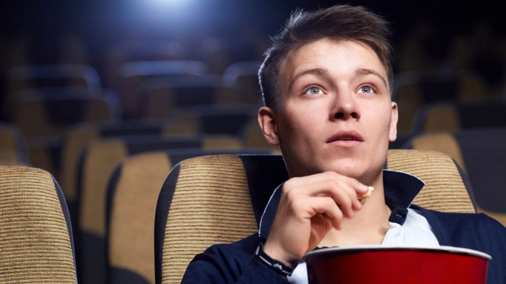15 Movies That Aged Well Focused Man Watching a Movie MSN