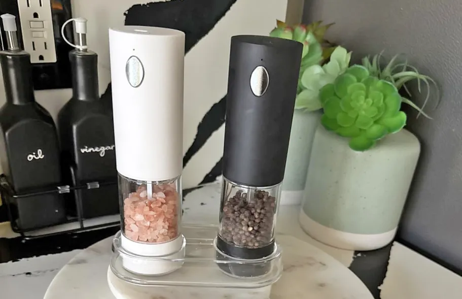 Electric Salt & Pepper Grinder Set Just $11.99 on Amazon and & black salt & pepper grinder set on kitchen counter
