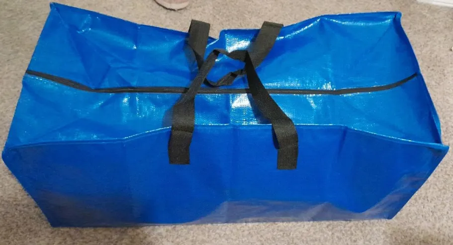 Heavy-Duty Large Moving Storage Bags 6-Pack Just $14.99 on Amazon (Reg. $30) packing bags in blue on the floor