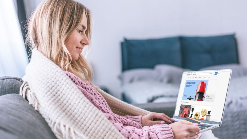 Woman Using Laptop Open EBay Website