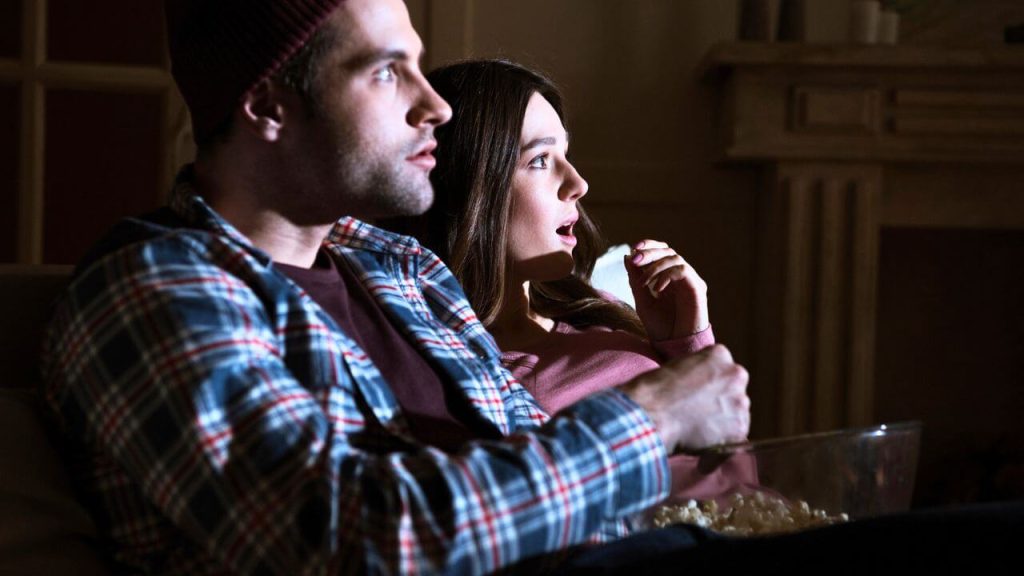 Planning A Foreign Film Marathon? The 20 Best Films from Around the World Couple Watching TV