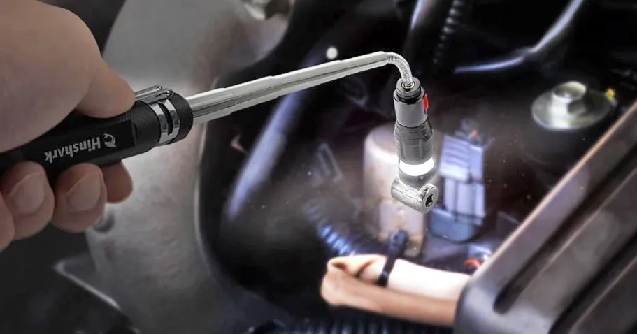 Telescoping LED Flashlight & Magnetic Pickup Tool Just $8.49 on Amazon (Reg. $18) hand using a magnetic pickup tool to get loose bolt from car