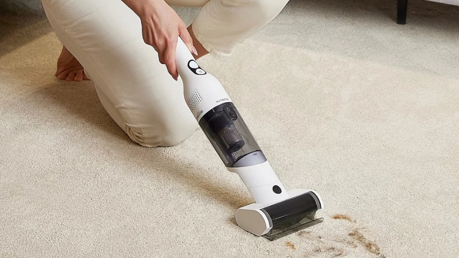 Tineco GO MINI Handheld Vacuum from $34.98 Shipped (Reg. $108) tineco mini hand vac vacuuming up pet hair from carpet