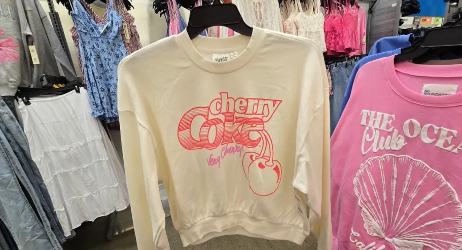 Women’s Cherry Coke Sweatshirt Only $14.98 on Walmart.com (Sizes Are Going Fast!) Cherry coke sweater displayed at the store