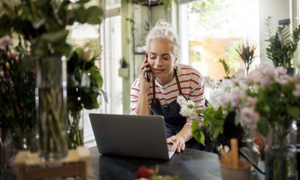Woman working in flower shop