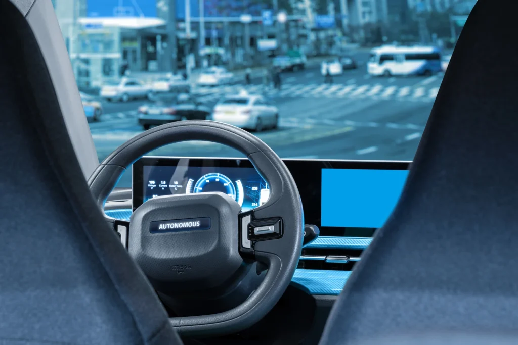 Self driving car on a road. Autonomous vehicle. Inside view.