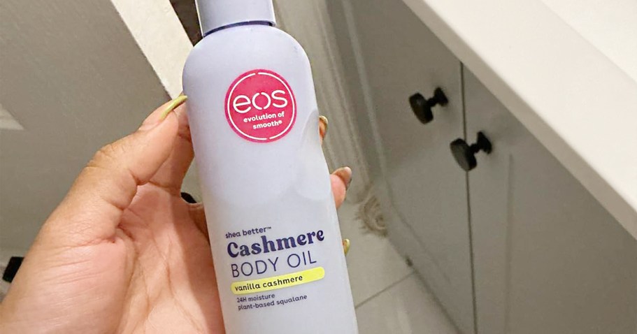 eos Cashmere Oil Only $5.84 Shipped on Amazon (Reg. $15) hand holding eos oil bottle