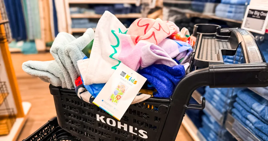 THREE Kohl’s Beach Towels Only $14.22 (Just $4.74 Each) beach towels piled into a black kohls shopping cart