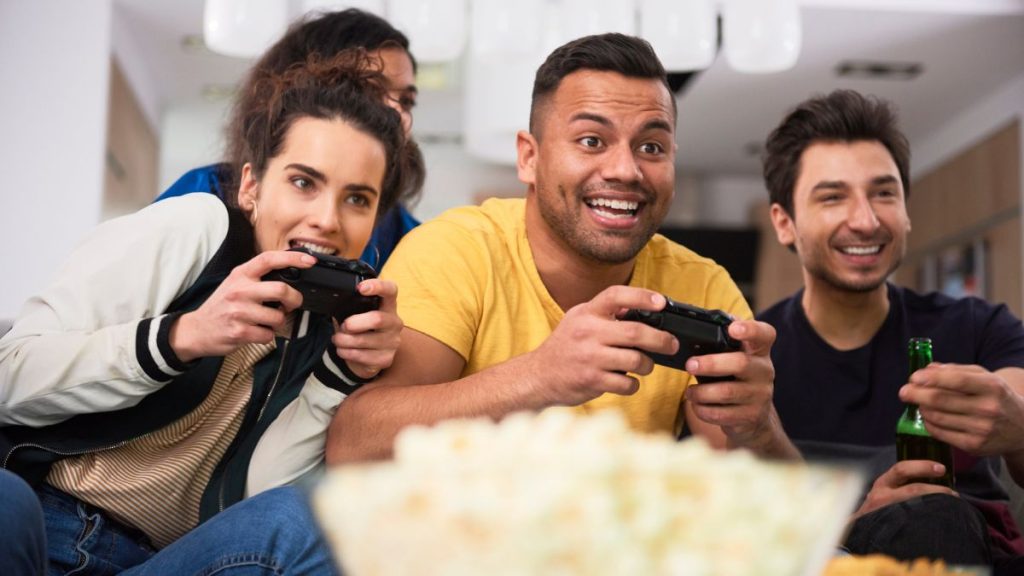 18 Unforgettable Purchases That Make Grown-Ups Smile Group of people playing video games MSN