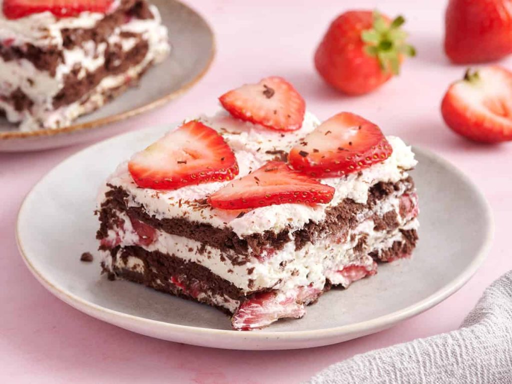 Icebox Cake – Budget Bytes Side view of a slice of chocolate strawberry icebox cake.