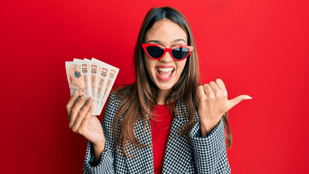 Woman Holding Cash Money Looking Excited and Happy MSN